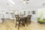 Upstairs dining has soaring ceilings and is adjacent to the kitchen 